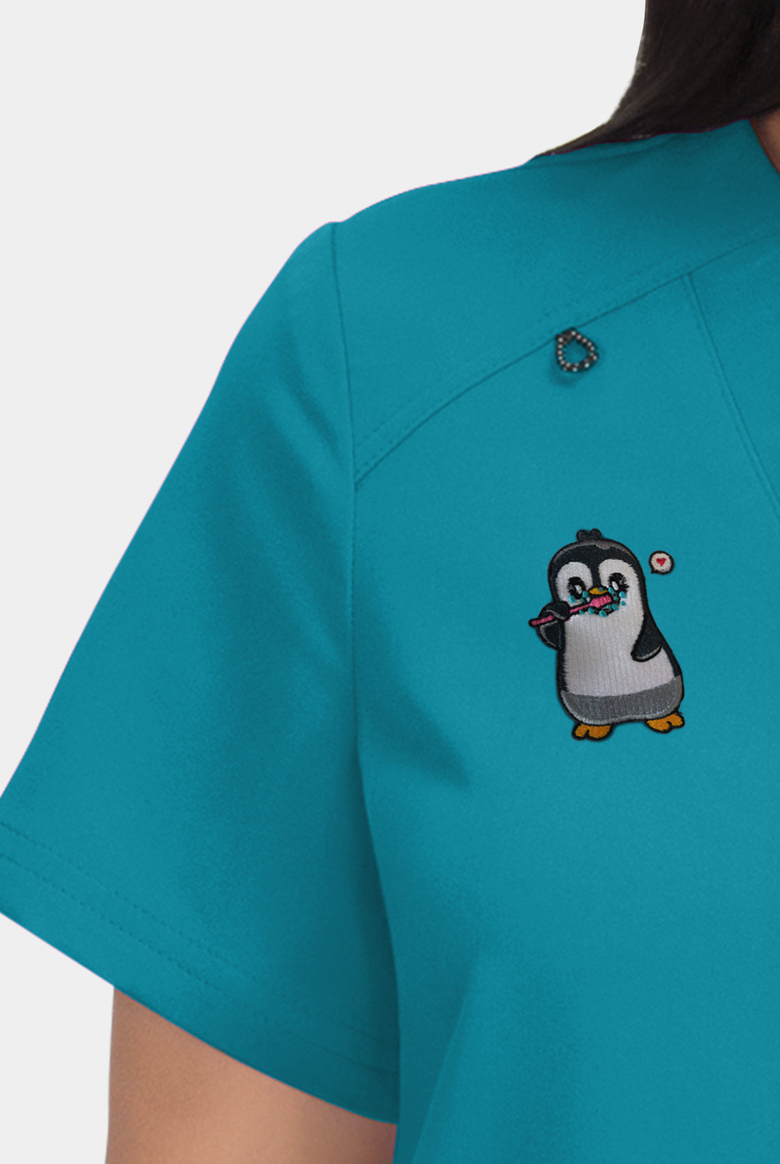 Hustle and heart teal embroidery close-up