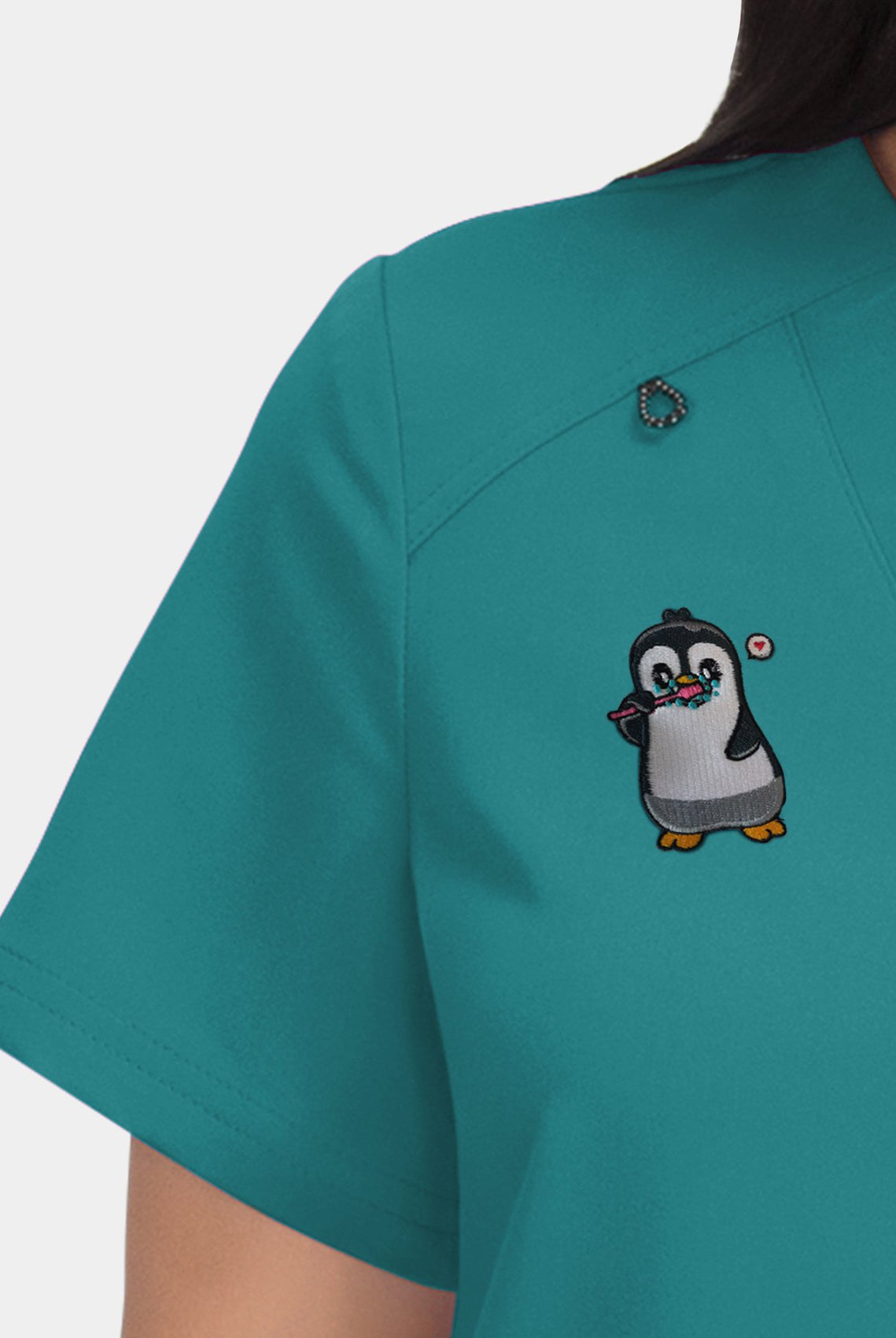 Hustle and heart teal embroidery close-up