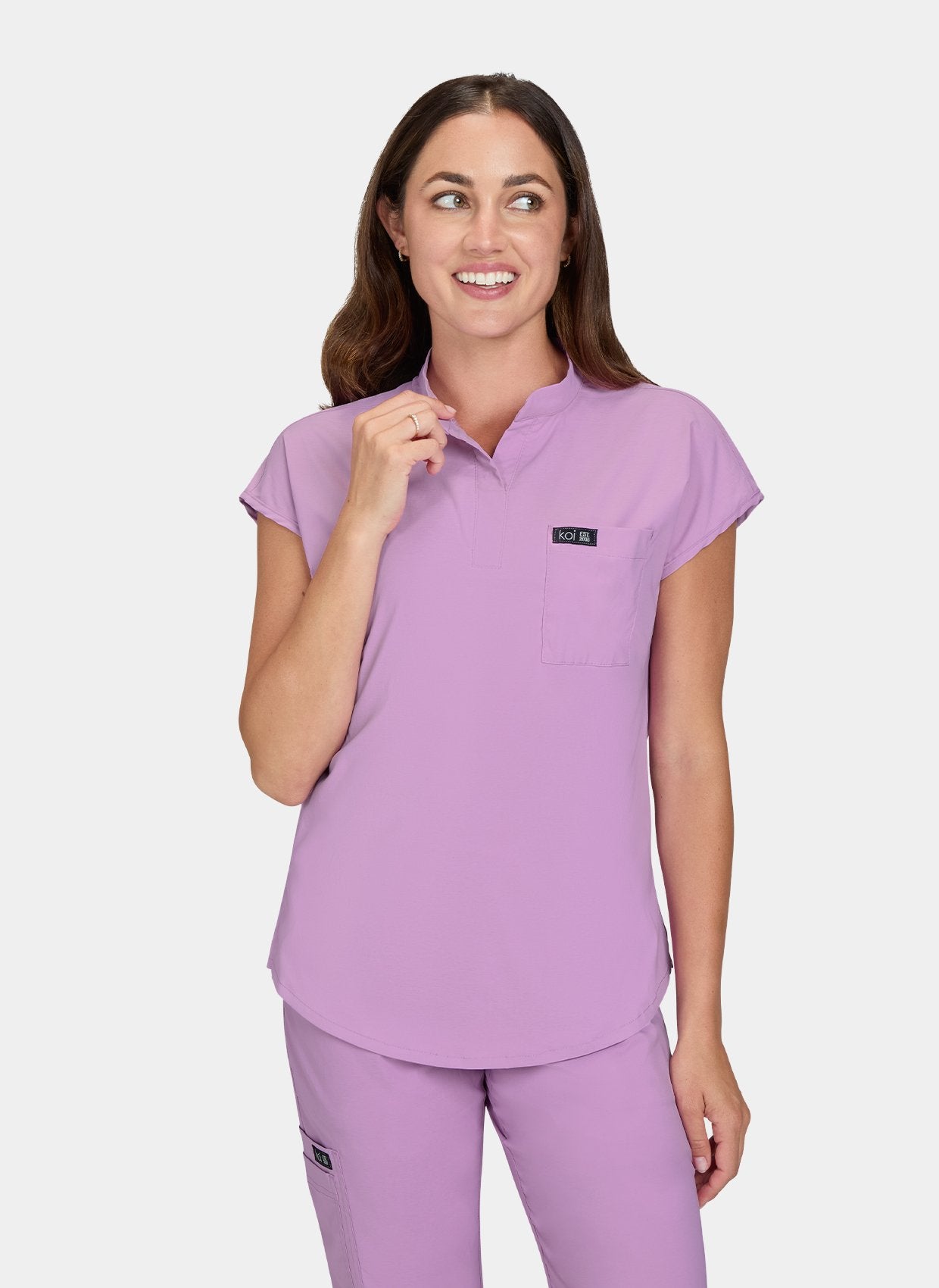 Koi basics Ari Scrub Top Bloom Lavender hand pose