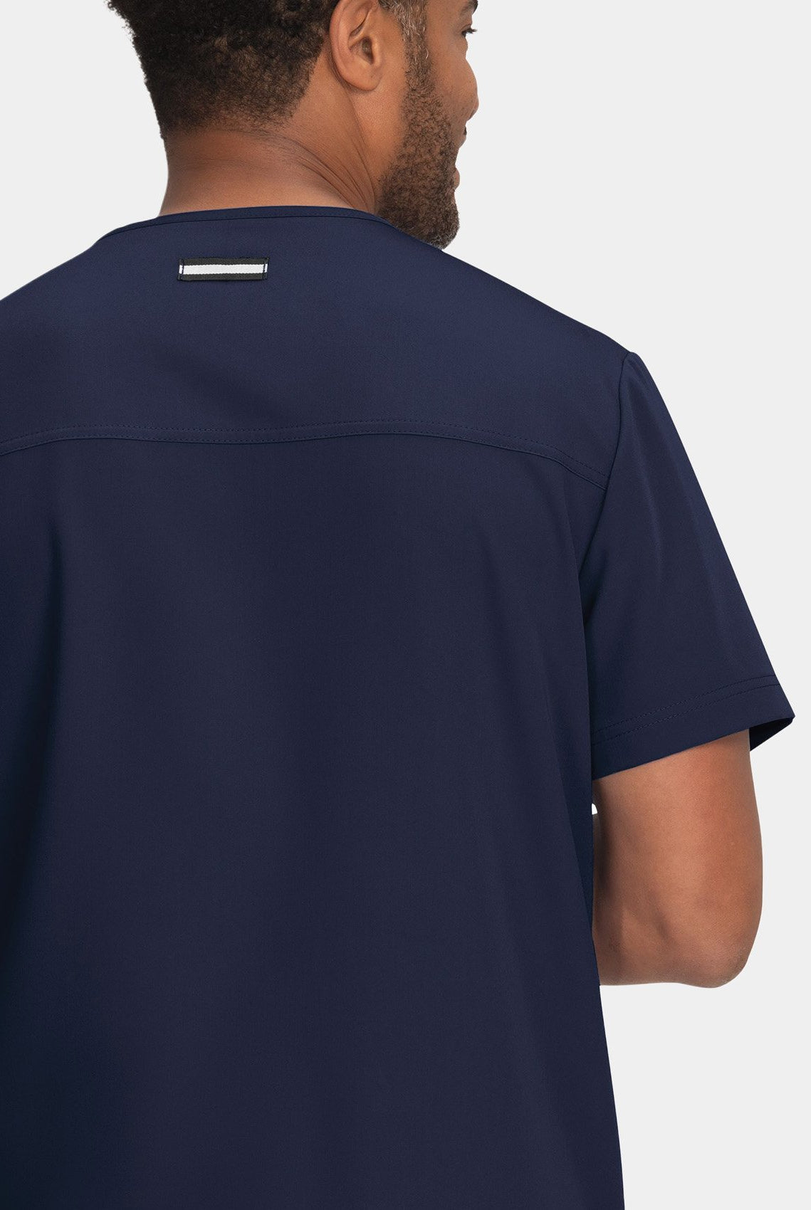 mens-koi-next-gen-free-to-be-scrub-top-front-navy-1
