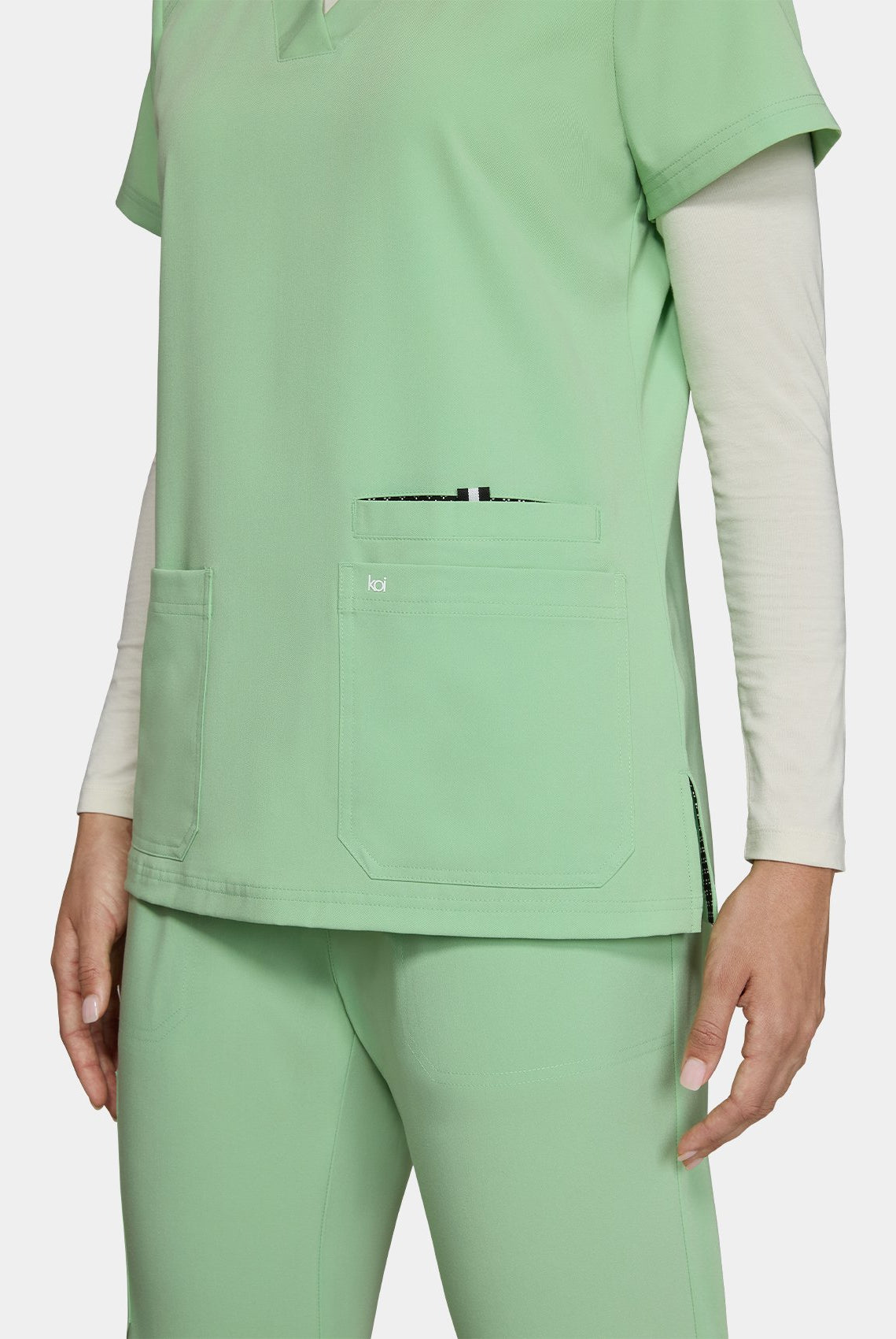 Women's Koi Next Gen Hustle and Heart Scrub Top in Pistachio