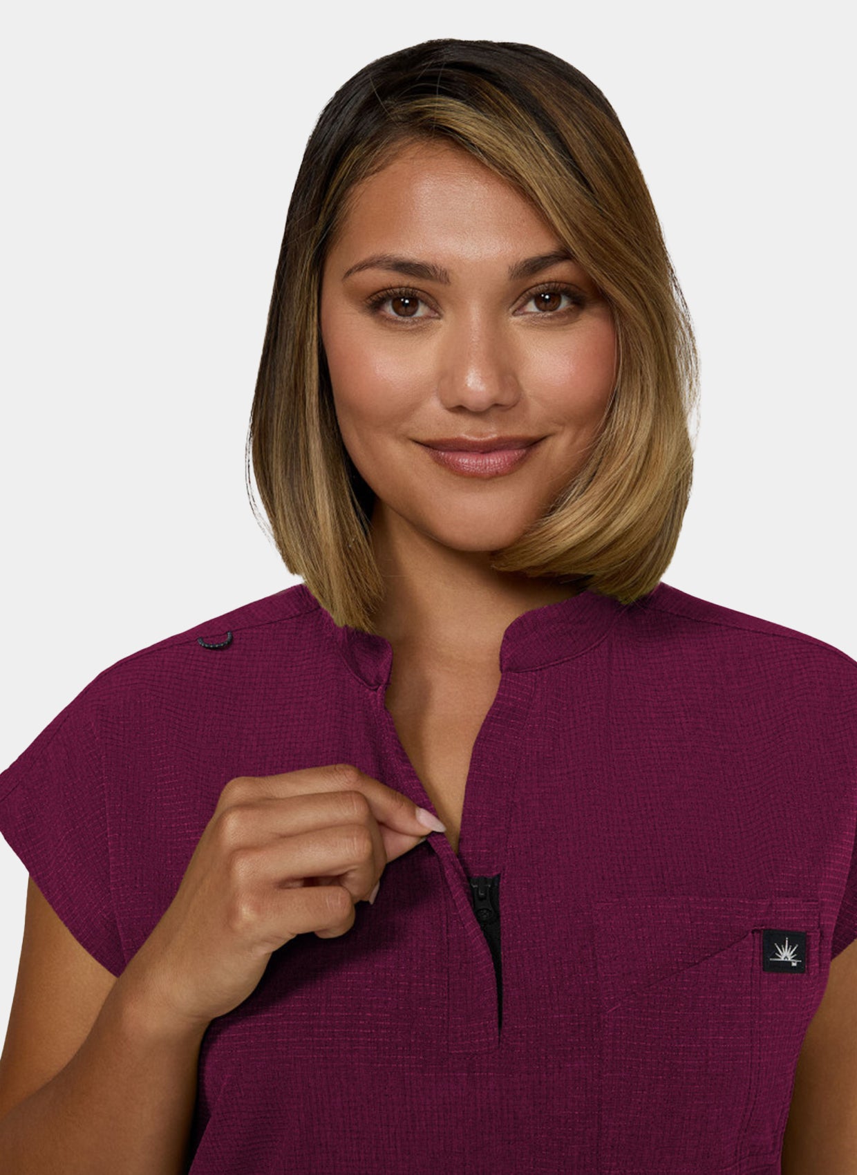 Koi Solis Catrin scrub top wine up close