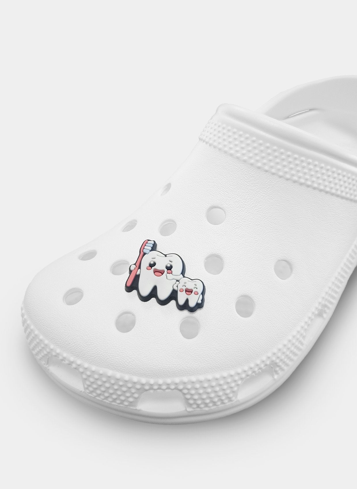clog charm dental brush bestie